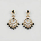 Onyx Circle Noor Earrings gold chandbali hoops with black onyx and pearl fringe on gray background