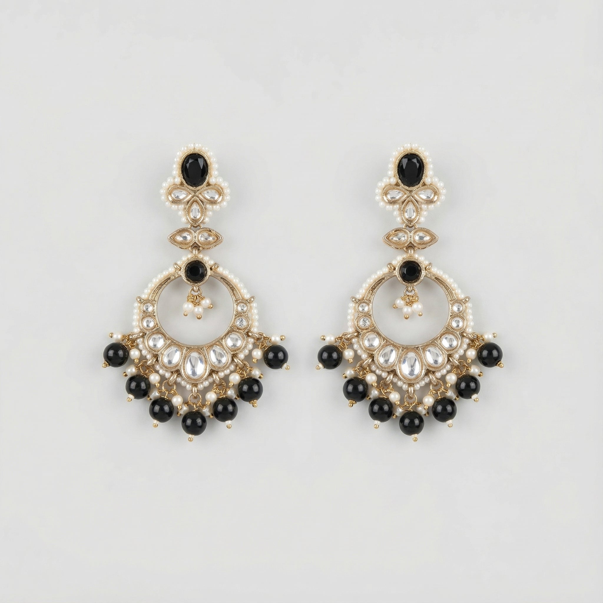 Onyx Circle Noor Earrings gold chandbali hoops with black onyx and pearl fringe on gray background