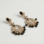 Onyx Circle Noor Earrings detail showing onyx floral stud, kundan teardrop fan, and black bead dangles