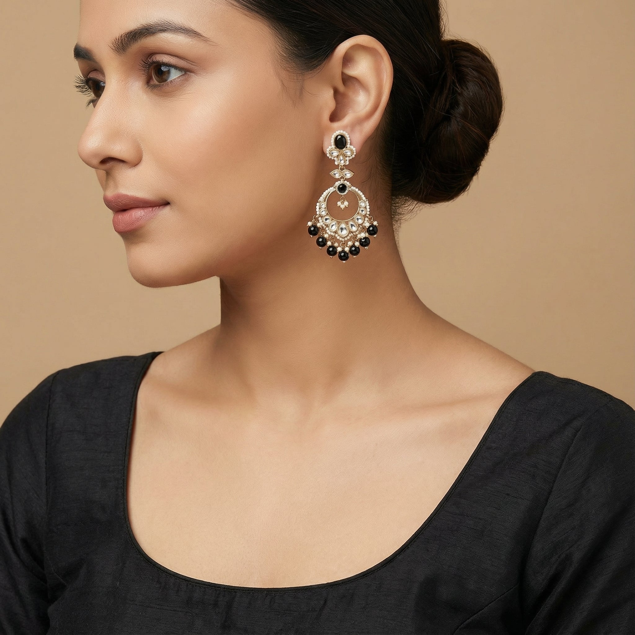 Onyx Circle Noor Earrings detail showing onyx floral stud, kundan teardrop fan, and black bead dangles