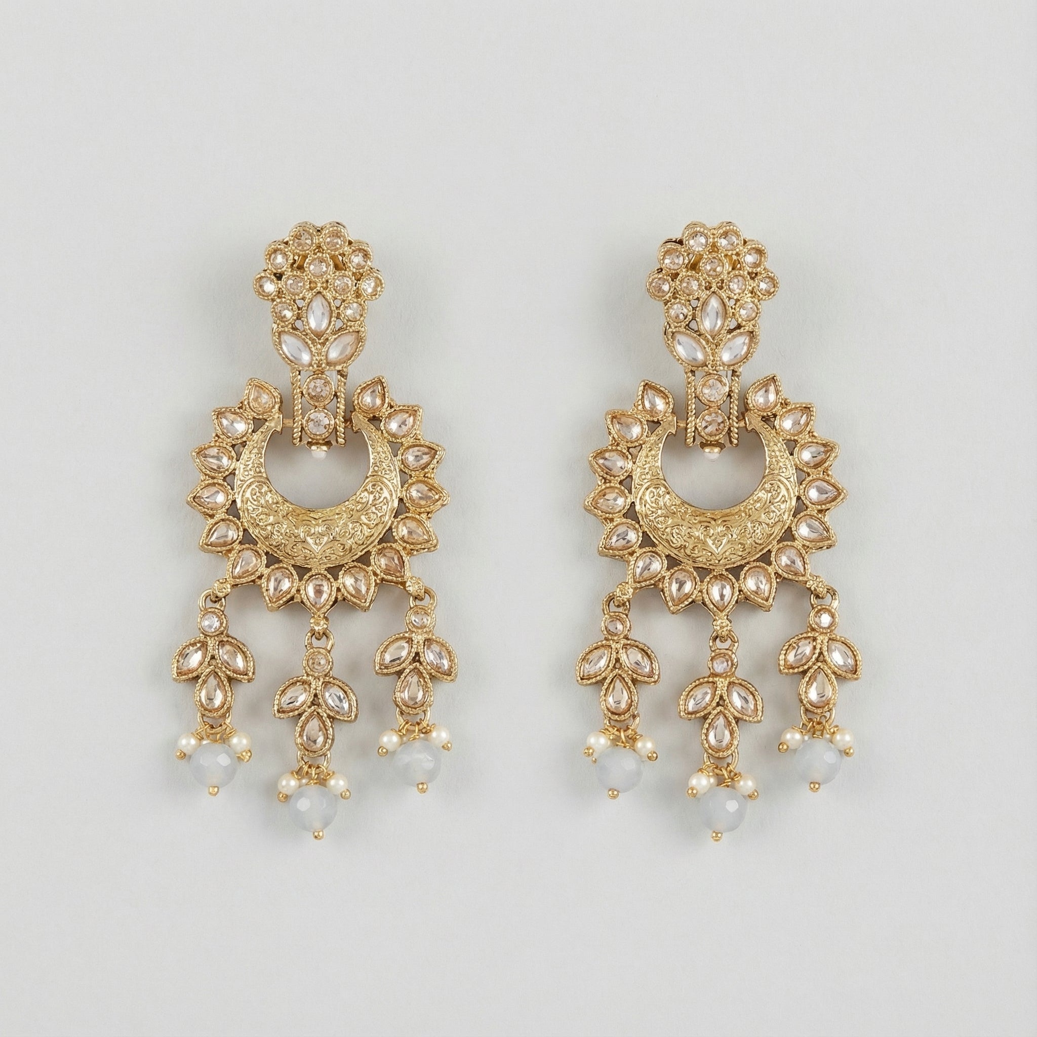 Moonstone Veil Crescent Earrings detail showing engraved crescent and pale blue bead drops
