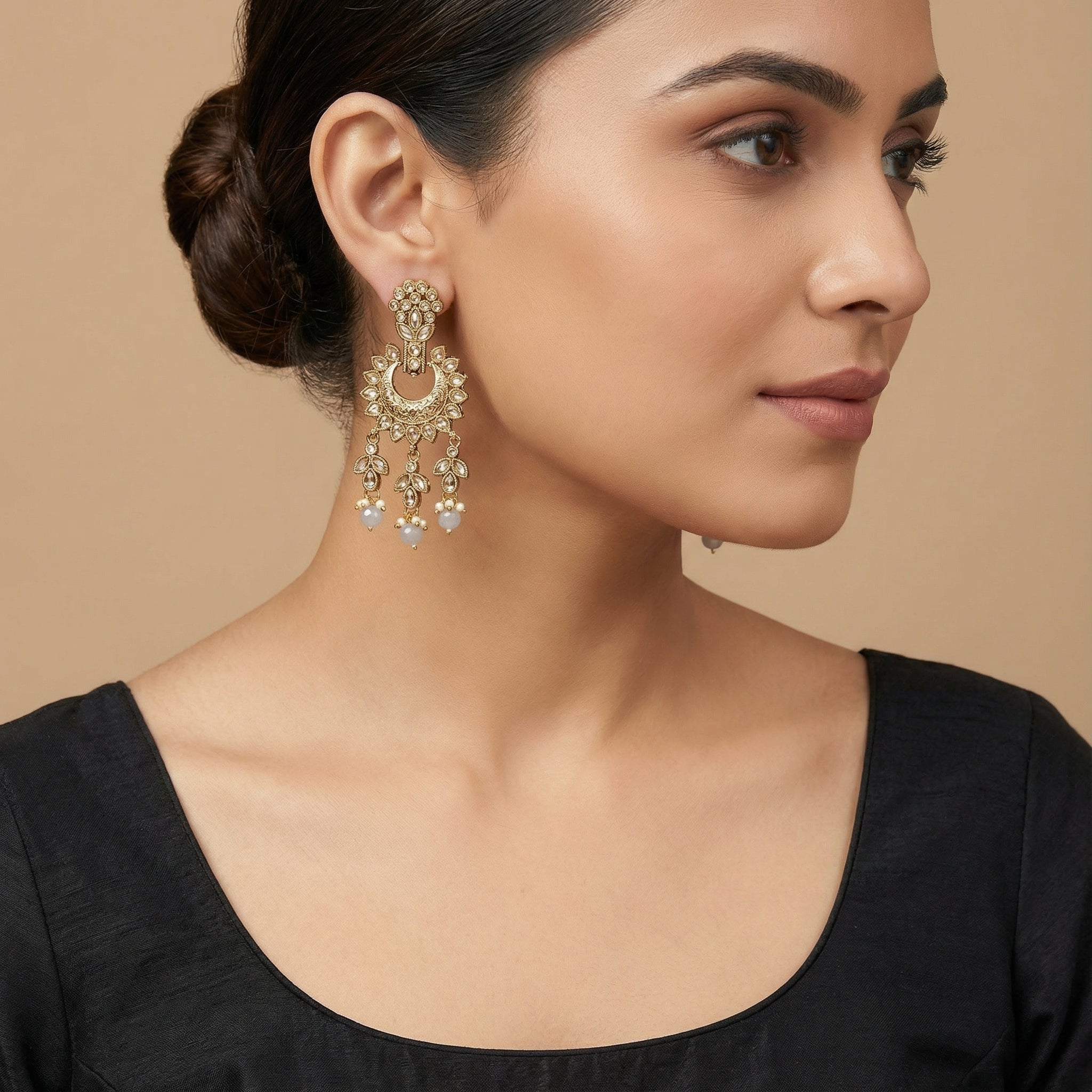 Moonstone Veil Crescent Earrings detail showing engraved crescent and pale blue bead drops