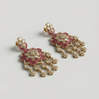 Rani Kundan Cascade Earrings detail showing polki floral center, pearl rim, and dangling pear drops