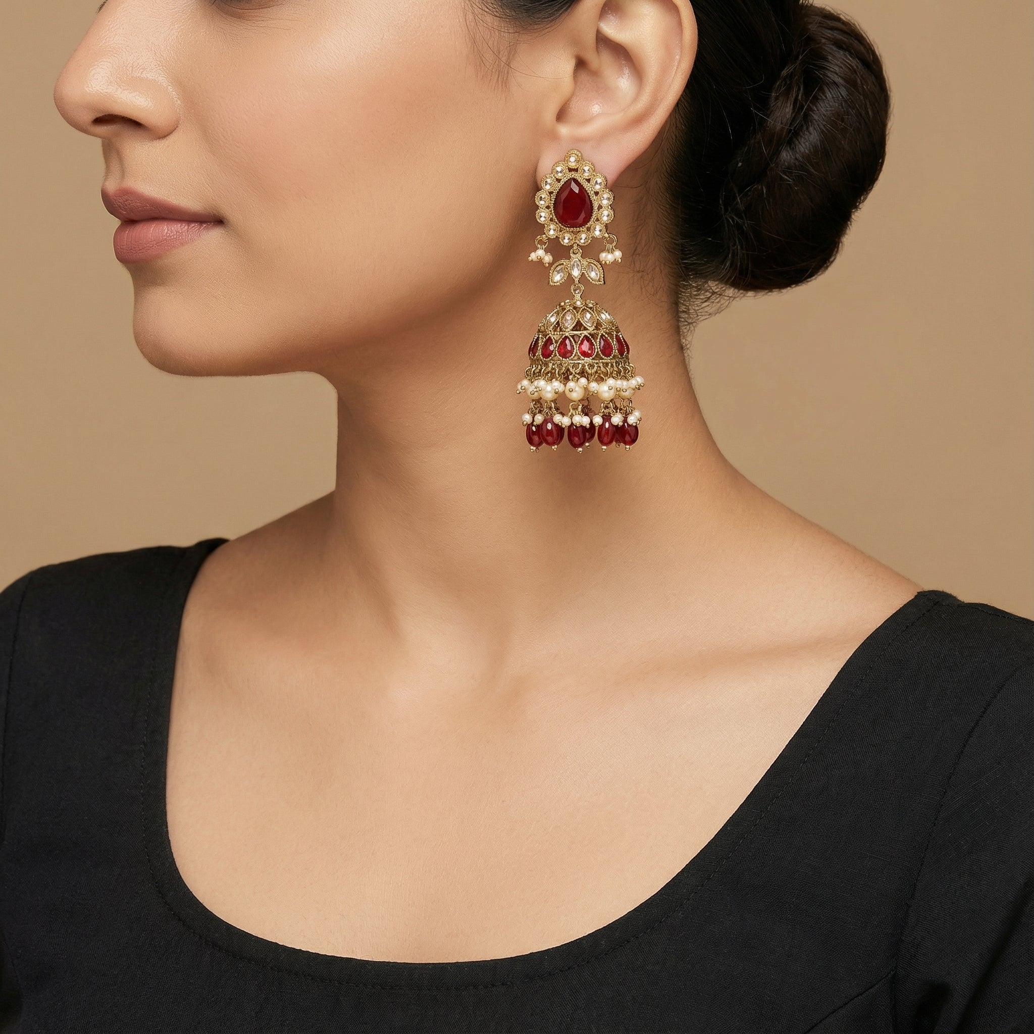 Noor Mahal Ruby Jhumka Earrings detail showing ruby stud halo and bell teardrop band