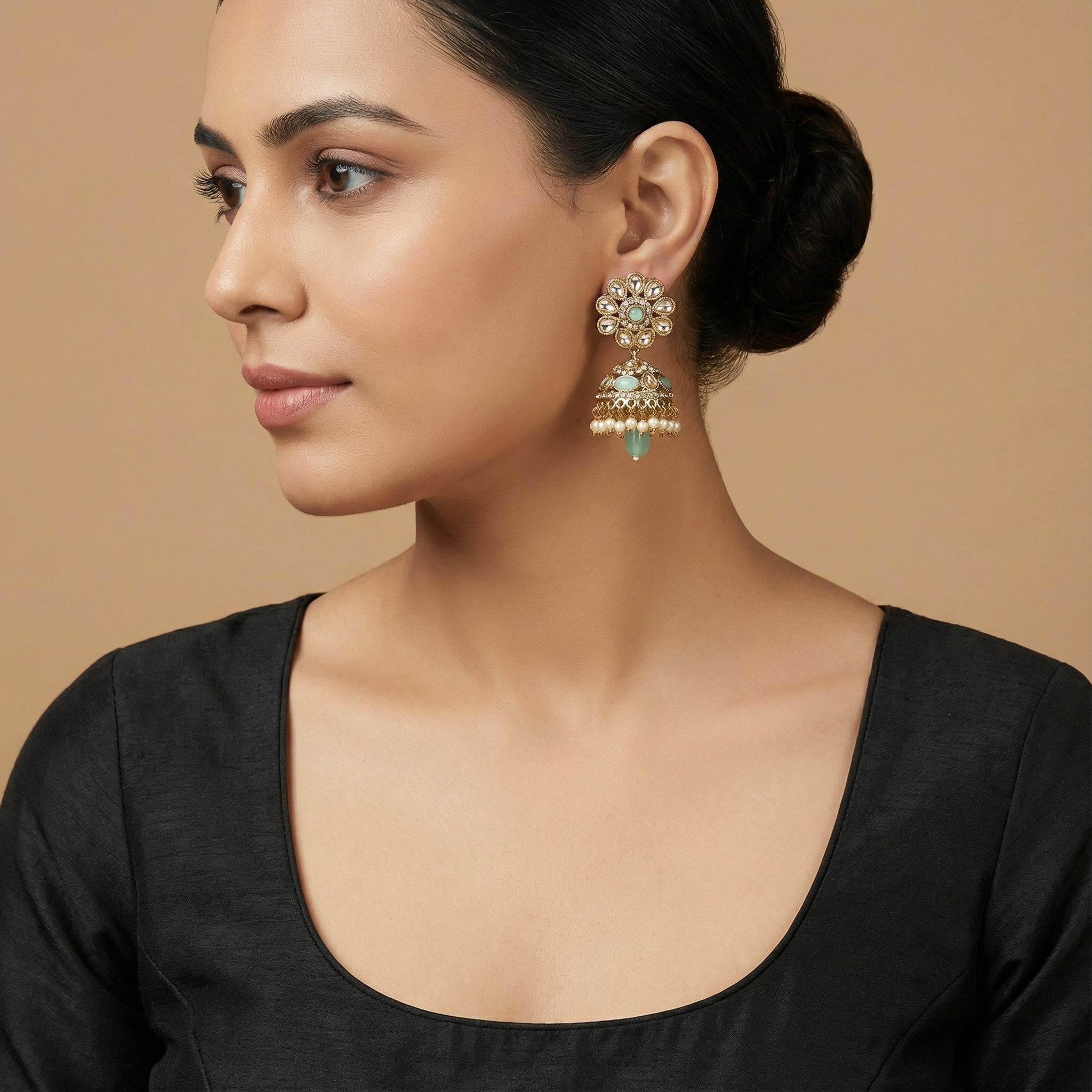 Pista Kundan Pearl Jhumka Earrings detail showing mint floral stud and bell dome accents