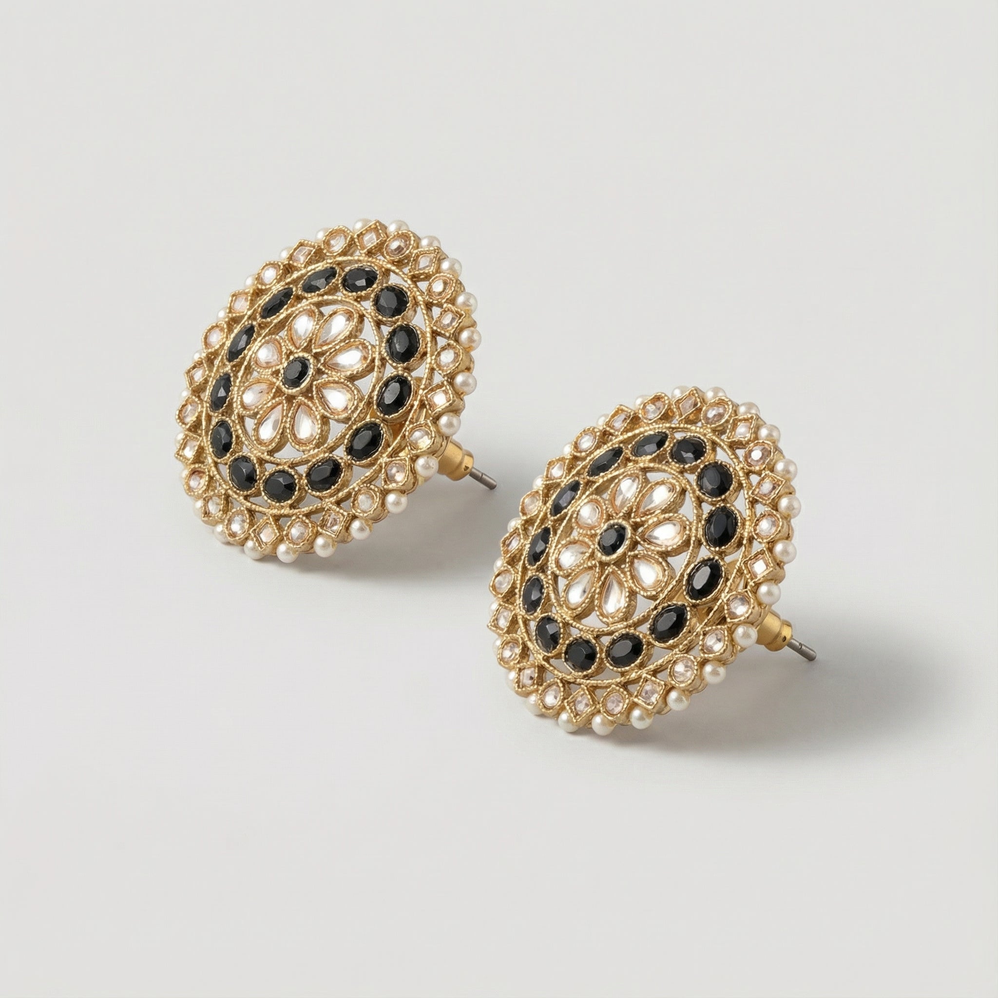 Noir Mandala Disc Earrings detail showing floral petal ring and pearl border
