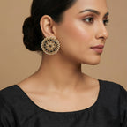Noir Mandala Disc Earrings detail showing floral petal ring and pearl border