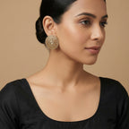 Golden Noor Disc Earrings detail showing oval center baguette rings and scalloped crystal border
