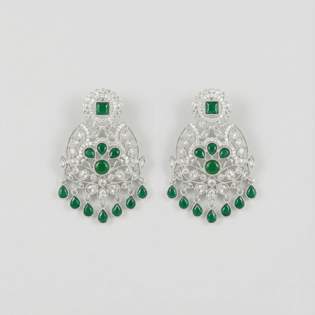 Emerald Chandni Statement Earrings rhodium filigree chandelier with emerald drops on gray background