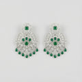Emerald Chandni Statement Earrings rhodium filigree chandelier with emerald drops on gray background