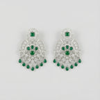 Emerald Chandni Statement Earrings rhodium filigree chandelier with emerald drops on gray background