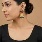 Gulnaar Emerald Dome Jhumkas detail showing embossed dome and colored stone floral top
