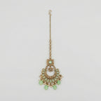 Mint Pearl Drop Tikka antique gold chaandbali maang tikka with mint stones and pearl fringe on gray background