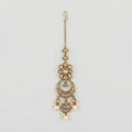 Ivory Aura Kundan Tikka antique gold chandbali maang tikka with kundan crescent and pearl drops on gray background