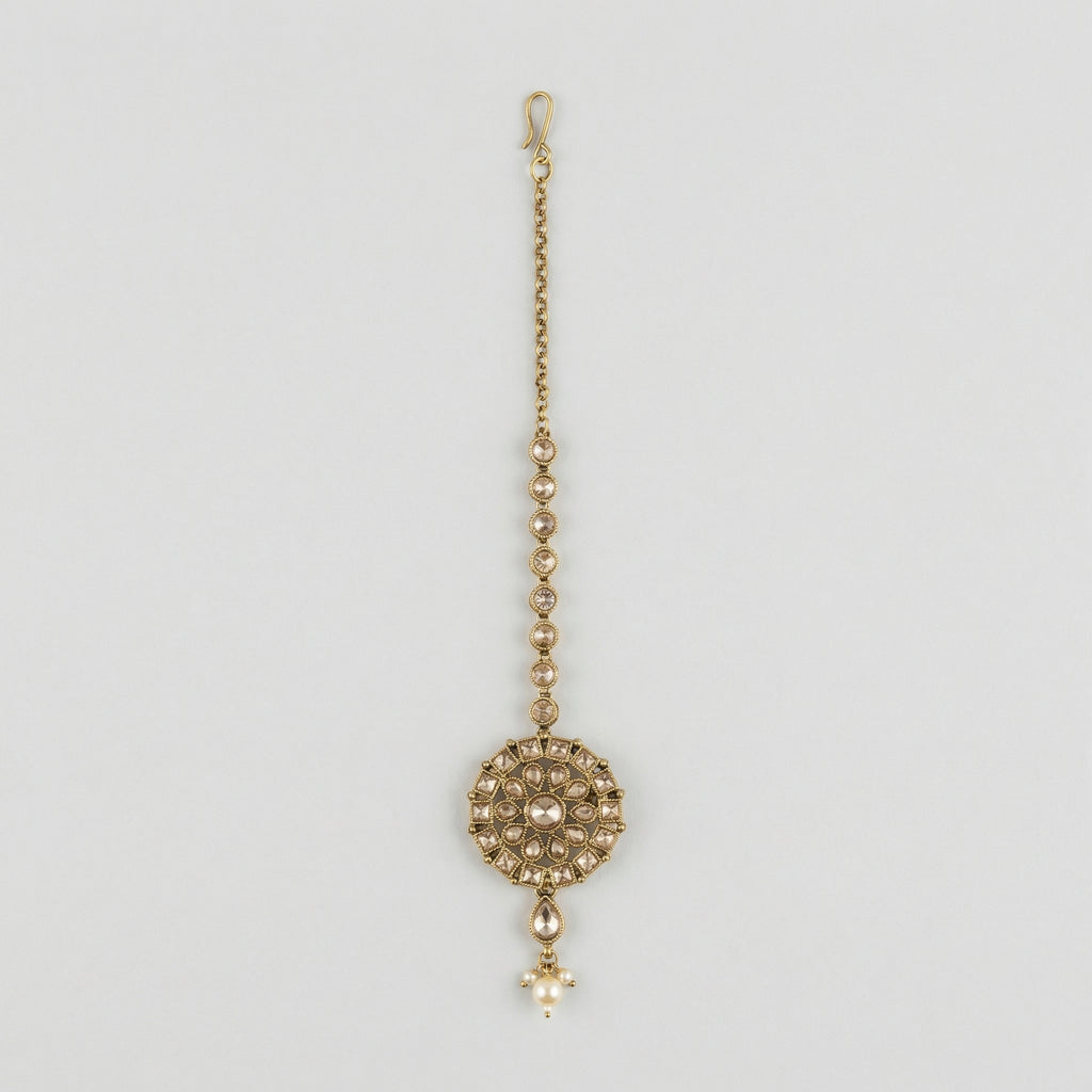 Classic Noor Round Tikka antique gold round mandala maang tikka with champagne stones on gray background