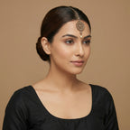 Classic Noor Round Tikka detail showing crystal link chain, floral medallion, and pearl-accent teardrop drop