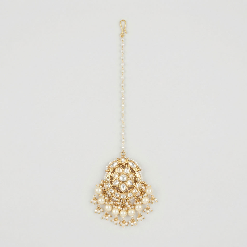 Luna Pearl Kundan Tikka gold maang tikka with pearl chain and kundan floral pendant on gray background