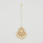 Luna Pearl Kundan Tikka gold maang tikka with pearl chain and kundan floral pendant on gray background