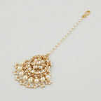 Luna Pearl Kundan Tikka detail showing pearl strand, clear stone floral center, and pearl drop fringe
