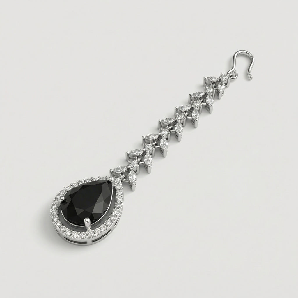 Onyx Halo Drop Tikka detail of marquise leaf chain links above blue center stone