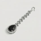 Onyx Halo Drop Tikka detail of marquise leaf chain links above blue center stone