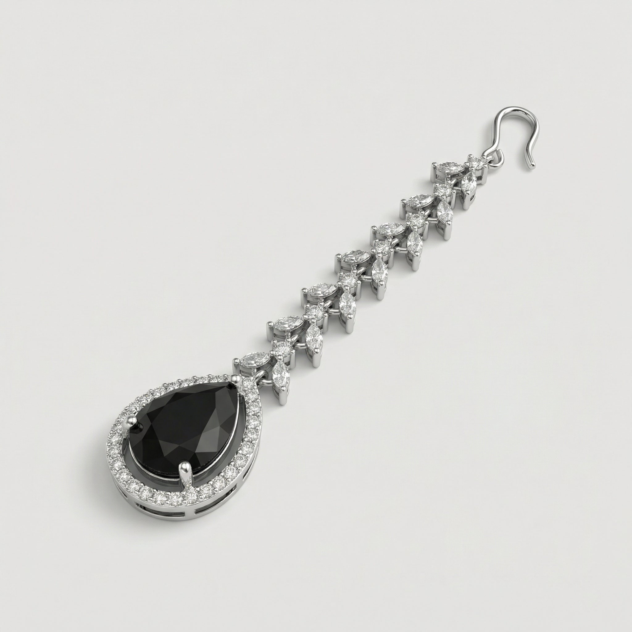 Onyx Halo Drop Tikka detail of marquise leaf chain links above blue center stone