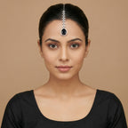 Onyx Halo Drop Tikka detail of marquise leaf chain links above blue center stone