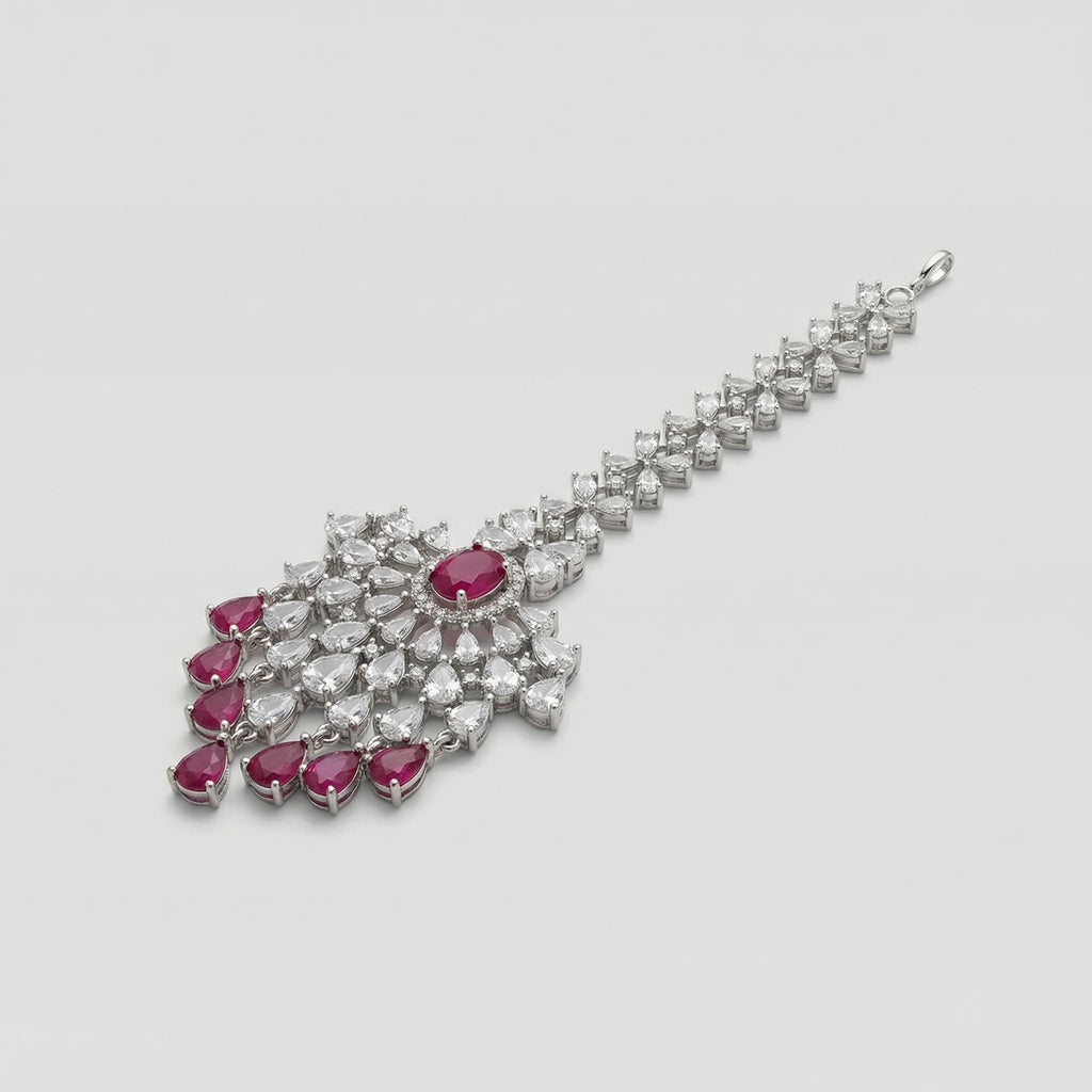 Noorani Ruby Tikka detail showing ruby oval centerpiece and kundan openwork fan