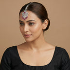 Noorani Ruby Tikka detail showing ruby oval centerpiece and kundan openwork fan