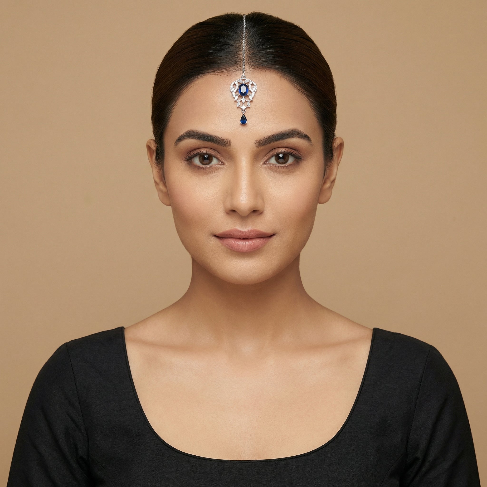 Sapphire Drop Crystal Tikka detail showing oval navy center, clear pavé frame, and navy teardrop drop