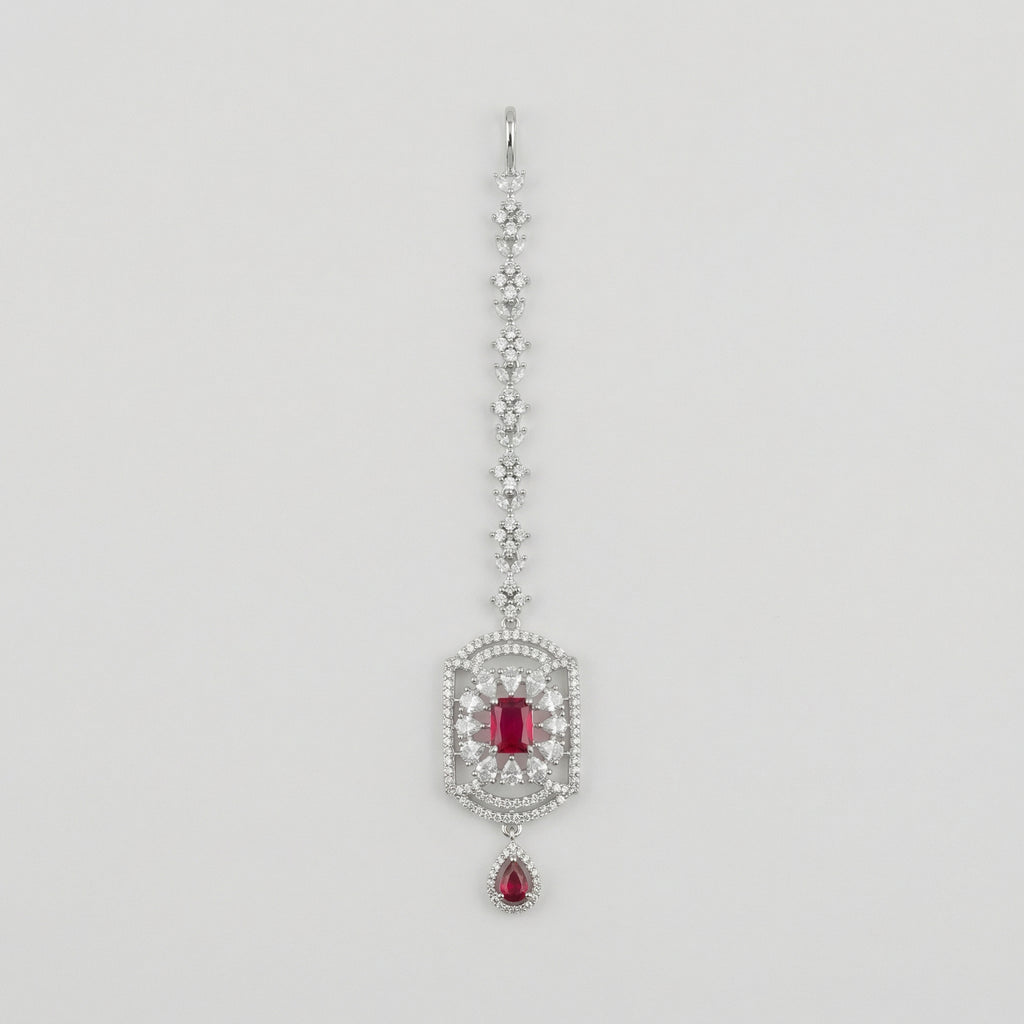 Rani Ruby Tikka silver maang tikka with ruby-red rectangular center stone on gray background