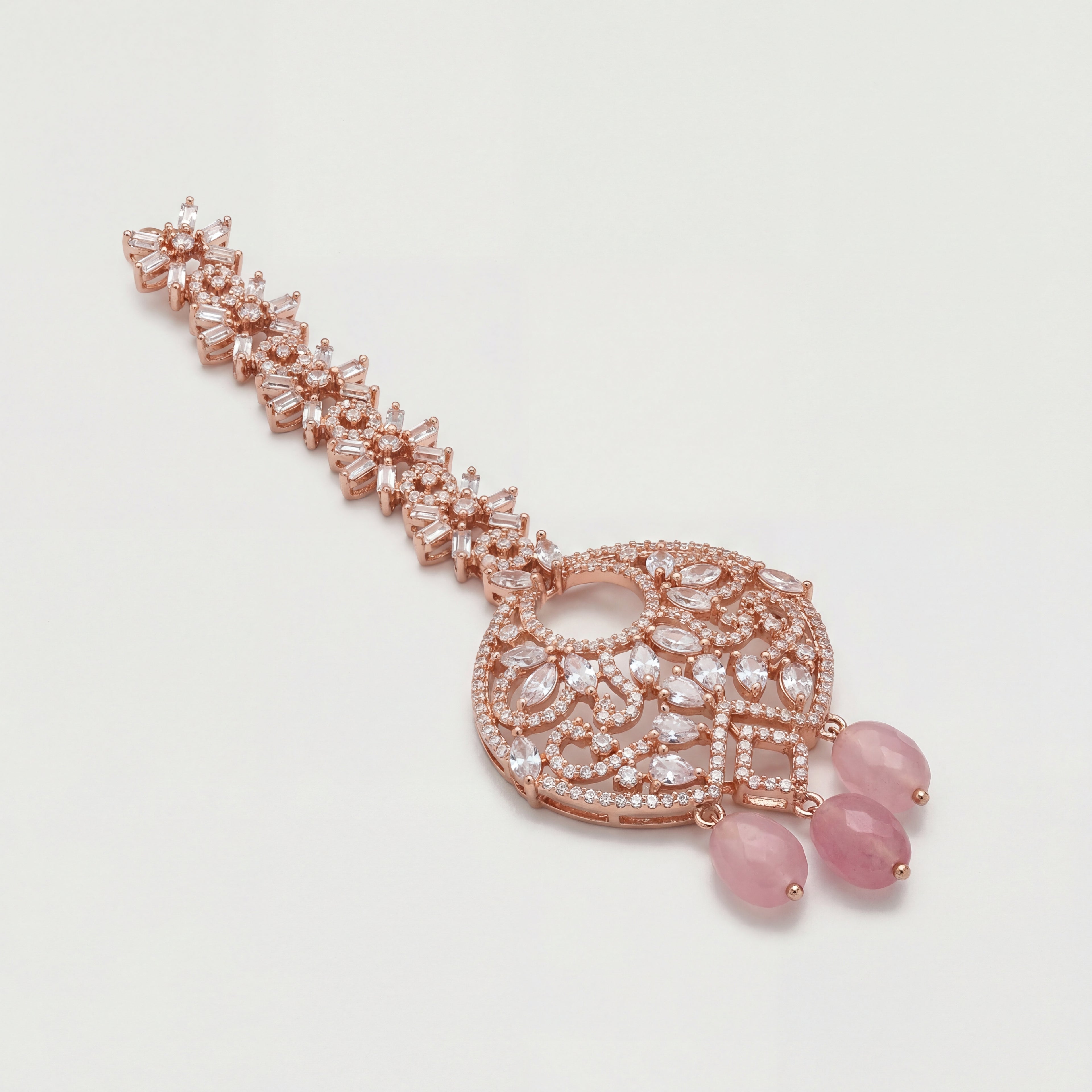 Blush Rosette Drop Tikka detail showing crystal link chain, filigree center, and pink bead fringe