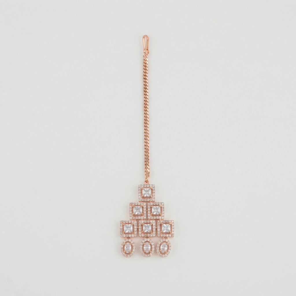 Rosette Frame Drop Tikka rose gold maang tikka with tiered square crystal frames on gray background