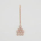 Rosette Frame Drop Tikka rose gold maang tikka with tiered square crystal frames on gray background