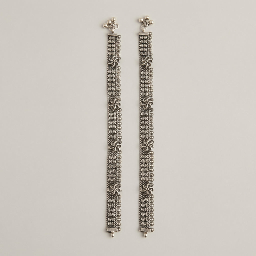 Oxidized Floral Payal detail showing infinity-link band ghungroo bells and textured floral studs