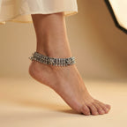 Oxidized Floral Payal detail showing infinity-link band ghungroo bells and textured floral studs