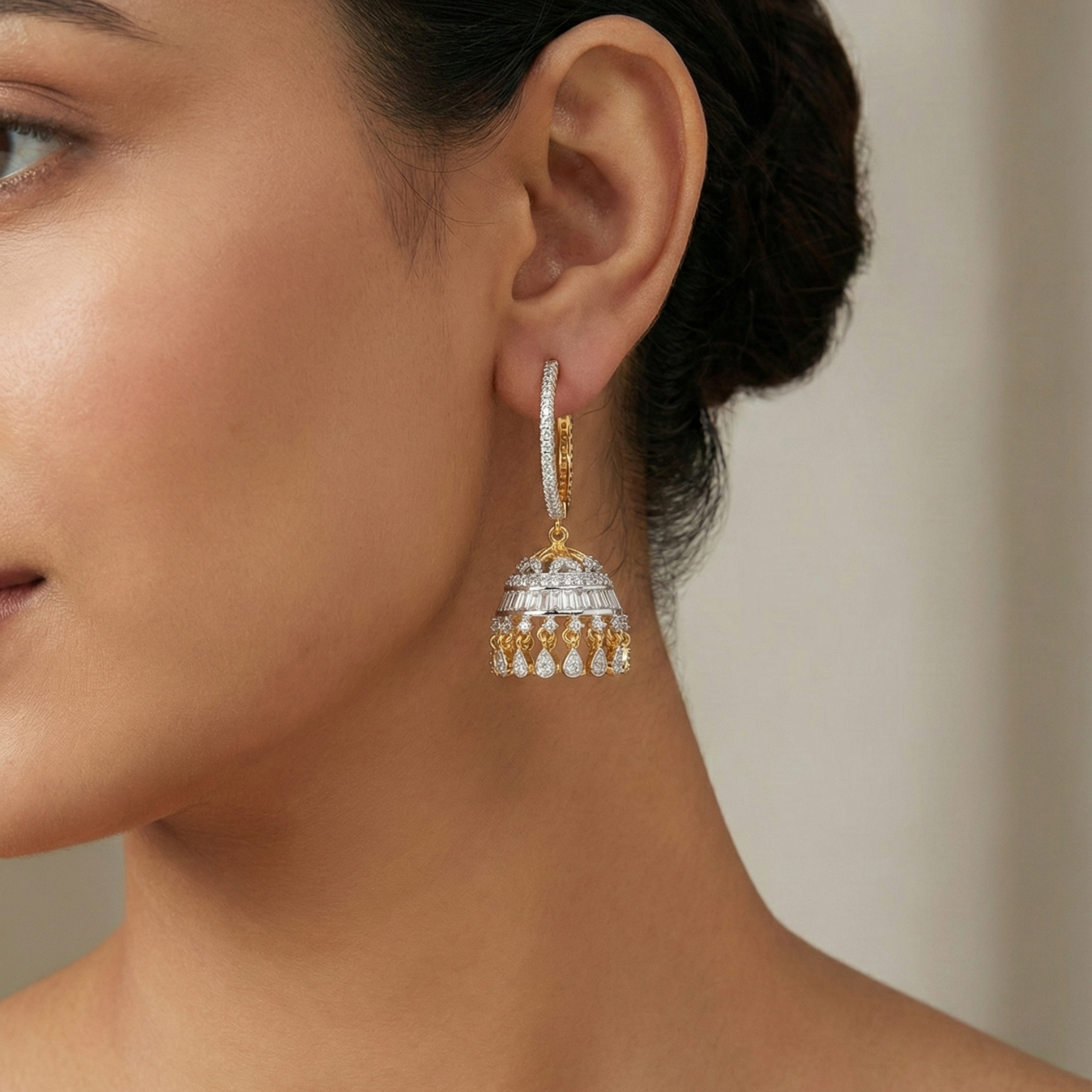 Sona-Ivory Halo Jhumkas detail showing pavé hoop, baguette band, and teardrop charms on the bell