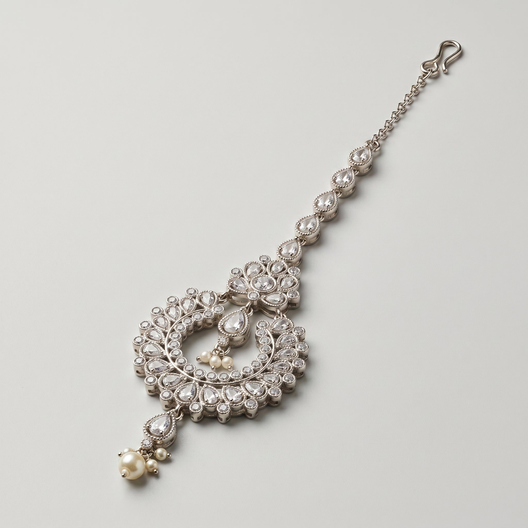 Rani Pearl Tikka detail showing teardrop chain pearl center and bottom pearl cluster