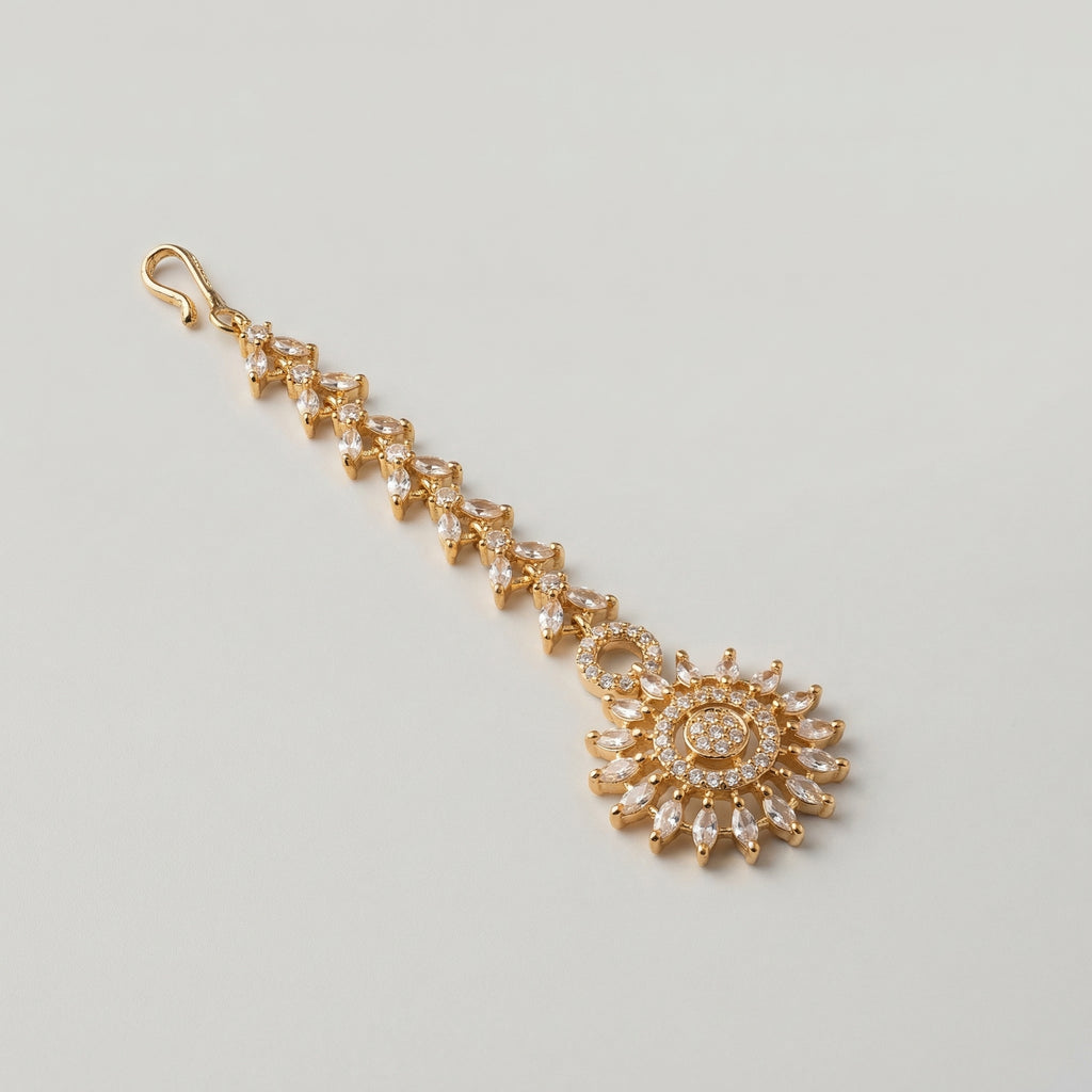 Kiran Tikka detail showing marquise link strand and pavé sunburst centerpiece