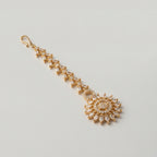 Kiran Tikka detail showing marquise link strand and pavé sunburst centerpiece