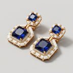 Neelam Enamel Earrings detail showing hinged sections, sapphire-blue centers, and crystal pavé halo