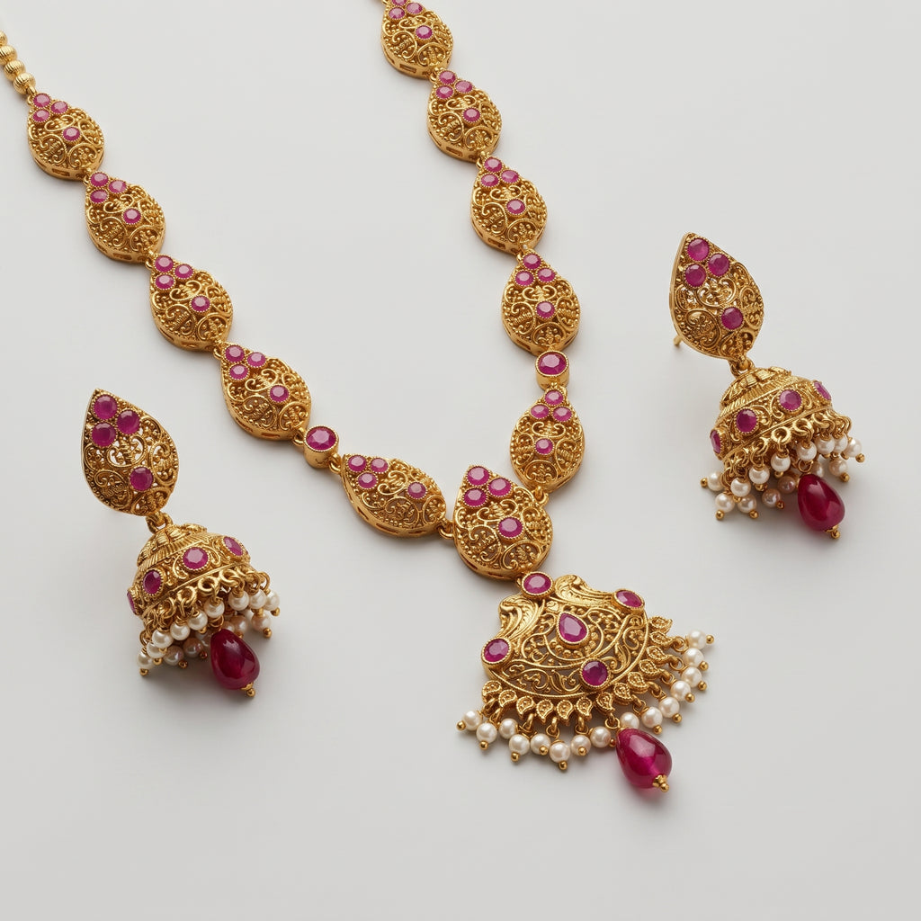 Ruby Pearl Earrings detail showing ruby leaf stud, filigree bell band, and center ruby drop