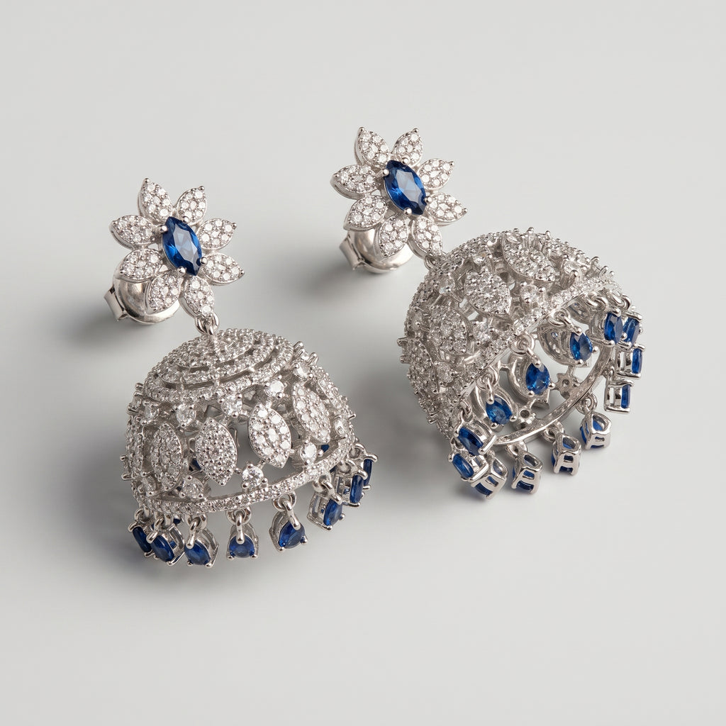 Neelam Jhumka Earrings detail showing floral blue stud and domed bell