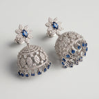 Neelam Jhumka Earrings detail showing floral blue stud and domed bell