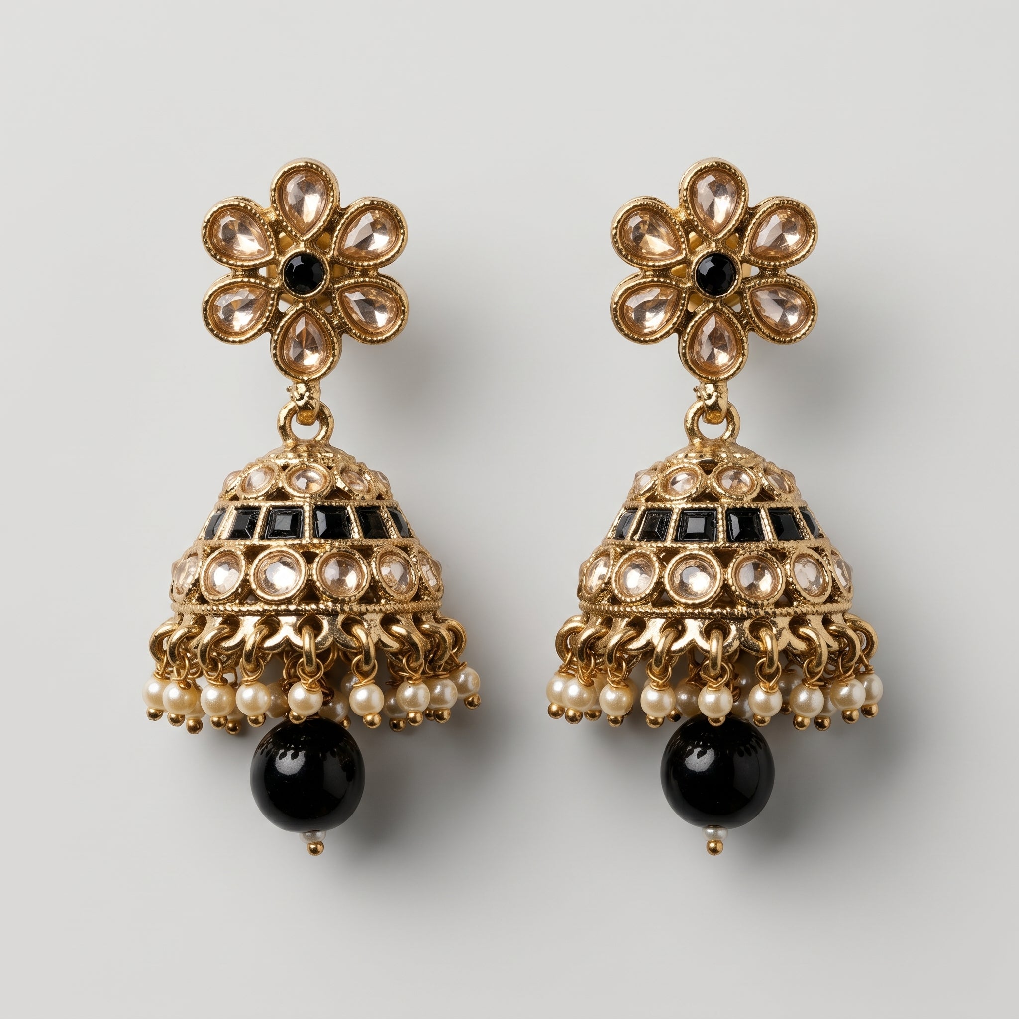Moti Jhumka Earrings detail showing champagne floral top black stone bands and pearl fringe drop