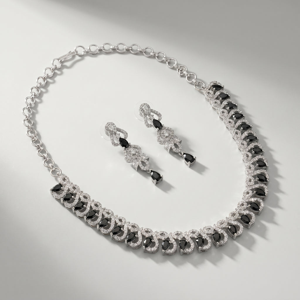 Rani Onyx Necklace Set detail of wave pavé links and black pear-cut stones