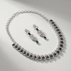 Rani Onyx Necklace Set detail of wave pavé links and black pear-cut stones