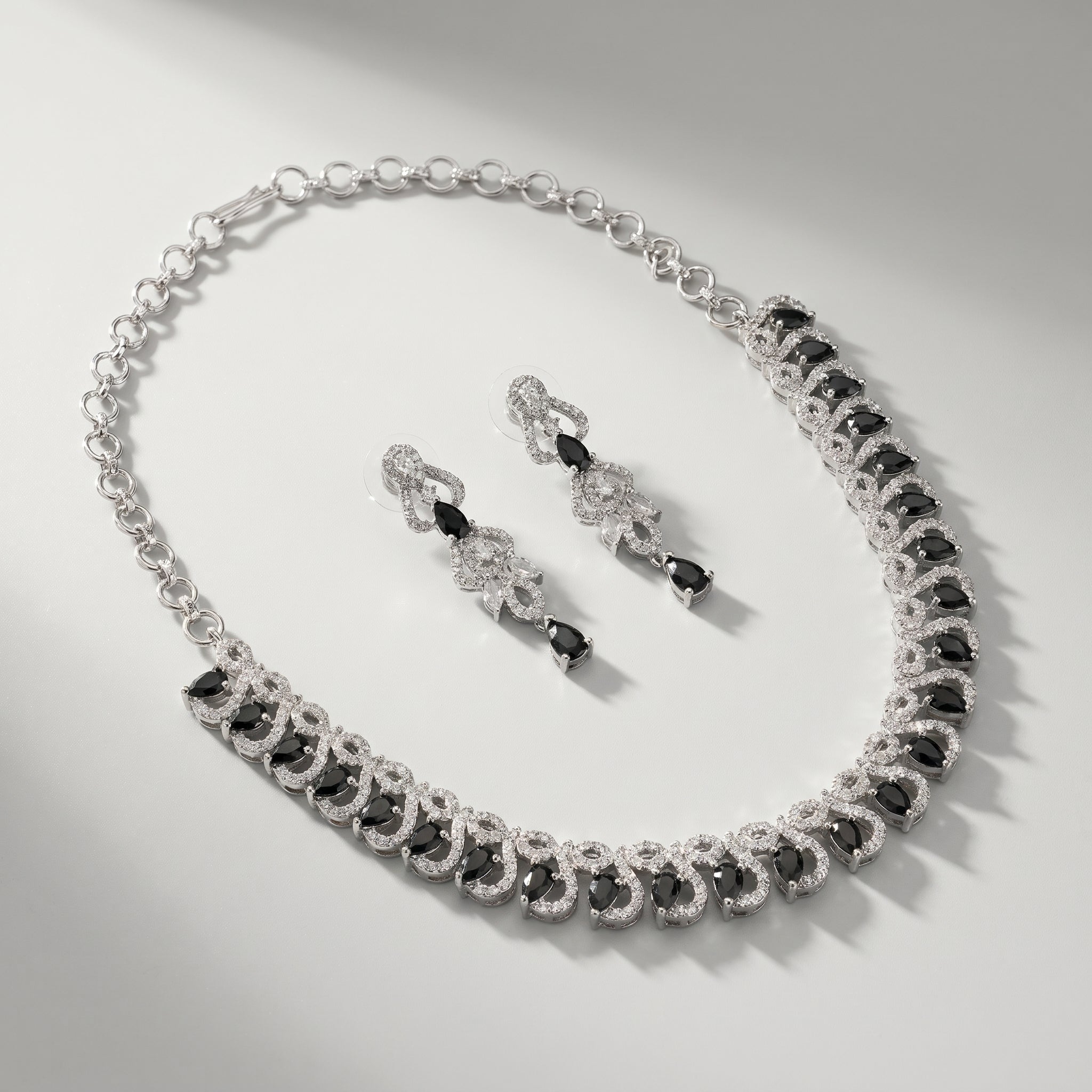 Rani Onyx Necklace Set detail of wave pavé links and black pear-cut stones