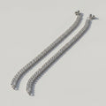 Starlight Anklet pair of silver-tone double-row square crystal payals with ball charms on gray background