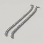 Starlight Anklet pair of silver-tone double-row square crystal payals with ball charms on gray background